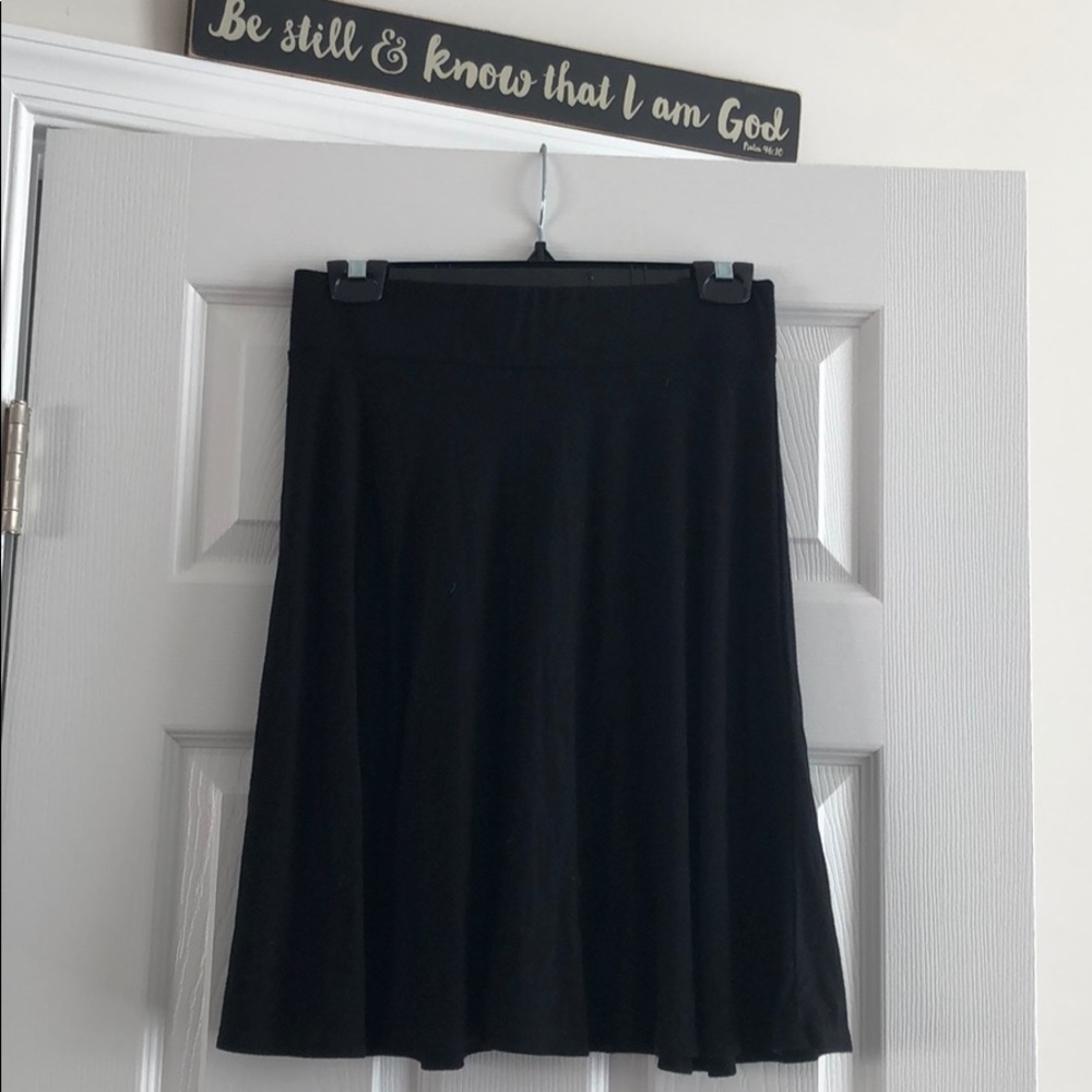 flirty and light black skirt